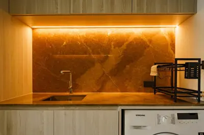a kitchen with a sink and a counter top at The Ozone Scarlet Grey Golf View Bangtao in Laguna Phuket