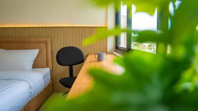 a bedroom with a bed and a desk and a chair at Quiet & Comfy studio - Walk to Rawai Beach - 