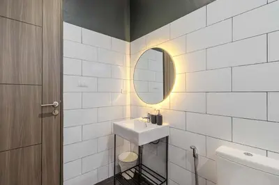 a bathroom with a sink and a mirror at V243 Quite 3BR Pool Villa Bathtub Near Beach in Bang Tao Beach