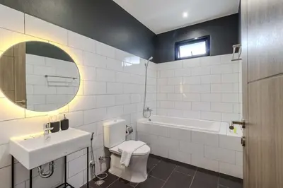 a bathroom with a sink and a toilet and a tub at V243 Quite 3BR Pool Villa Bathtub Near Beach in Bang Tao Beach