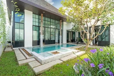an exterior view of a house with a swimming pool at MONO Villa Bang Tao 3 bedroom modern pool villa in Ban Pak Lak