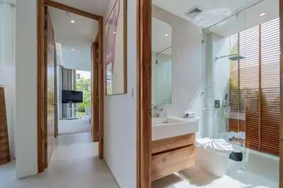 a bathroom with a sink and a mirror at 3bdr New Luxury Villa Bang Tao by CapitalPro ASH-06 in Ban Phru Champa