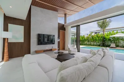 a living room with a white couch and a tv at 3bdr New Luxury Villa Bang Tao by CapitalPro ASH-06 in Ban Phru Champa