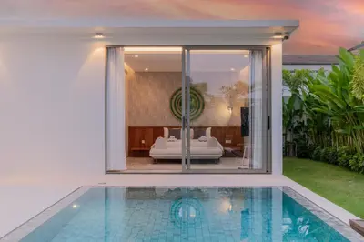 a house with a swimming pool and a living room at 3bdr New Luxury Villa Bang Tao by CapitalPro ASH-06 in Ban Phru Champa