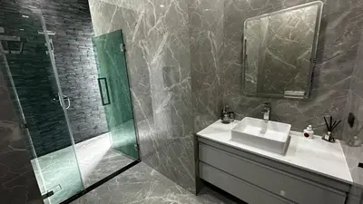a bathroom with a sink and a shower at Exclusive 2BR Pool Villa in Ban Saiyuan (1)