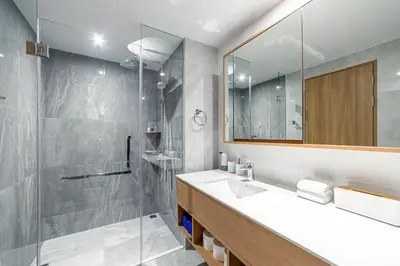 a bathroom with a sink and a shower at Beachside 2 bedrooms apartment 200 meters to Bang Tao Beach Manage by OCEAN HUB in Bang Tao Beach