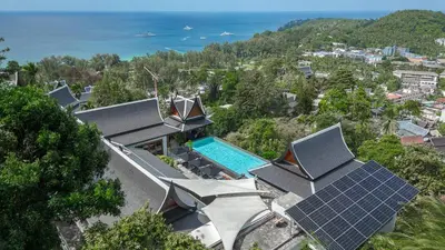 an aerial view of a house with solar panels at Luxurious Villa in Thalang with Private Pool and Ocean Views in Amphoe Thalang