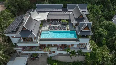 an aerial view of a house with a swimming pool at Luxurious Villa in Thalang with Private Pool and Ocean Views in Amphoe Thalang