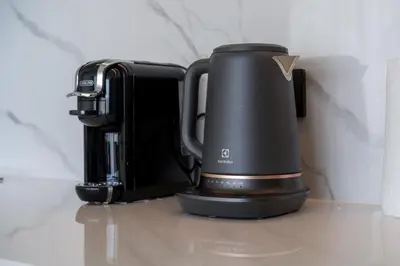 a coffee maker sitting on top of a counter at Sunshine Beach Luxury 3-bedrooms with a great view in Layan Beach