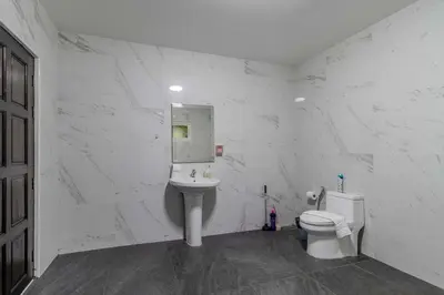 a white bathroom with a sink and a toilet at V245 3BR with Pool Close to Phuket Best Beaches in Rawai Beach