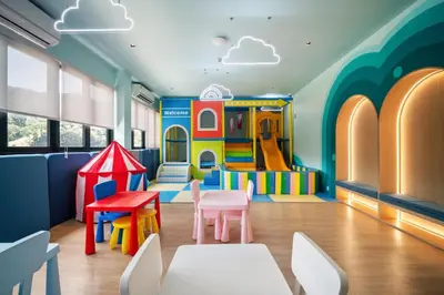 a childrens play room with a slide at Pool View Condo 2204 Wyndham Garden Resort in Phuket Town