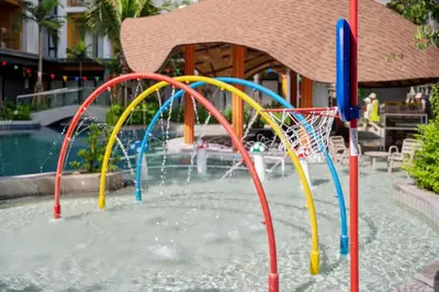 a water park with a bunch of water slides at Wyndham Gardens Elegant Studio Forrest View 2228 in Phuket Town