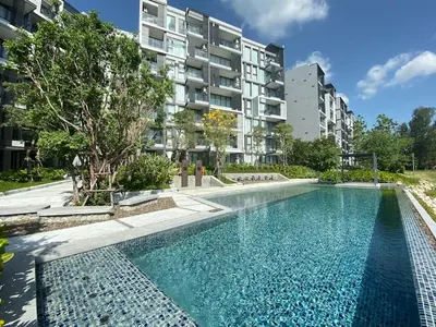 an image of a swimming pool in front of a building at Cassia Exclusive Lake View Condo Bang Tao Beach in Phuket Town