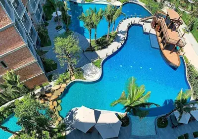 an overhead view of a pool at a resort at Pool Side Retreat 1 BED - TC-B105 in Phuket Town