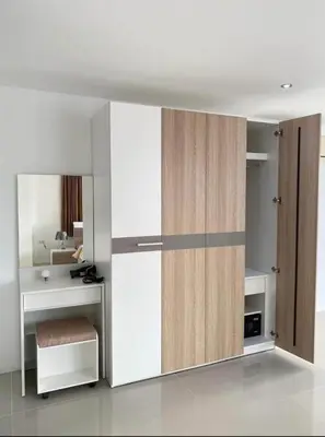 a kitchen with a sliding door in a room at Bayshore 2 Bedroom Spacious Seaview Apartment in Patong Beach