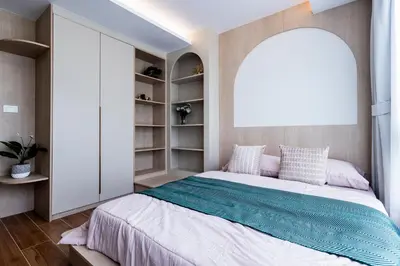a bedroom with a large bed and a large window at FantaSea condo Kamala 205 in Kamala Beach