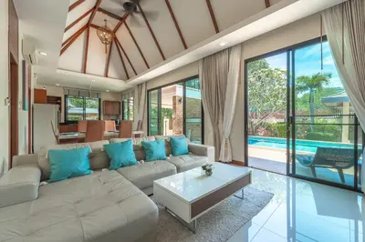 a living room with a couch and a table at 3 Bedrooms villa walking distance to Rawai beach in Rawai Beach