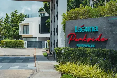 a sign for alaguna parrotalle headquarters at Laguna Park Phuket 5BR Villa with Rooftop Pool #84194 in Laguna Phuket