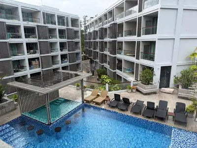 an aerial view of an apartment building with a swimming pool at The Regent Bang Tao Beach in Phuket