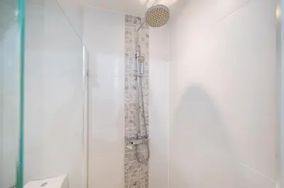 a bathroom with a shower with a glass door at Diamond Bangtao Beach 1 bedroom in Bang Tao Beach