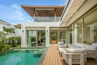 an open living room with a pool and a house at Akal pool villa 3BR near Laguna, Bangtao & Beach in Bang Tao Beach