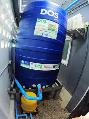 a large blue barrel on a shelf in a room at Krabi Top Sea Hill Villa in Klong Muang Beach