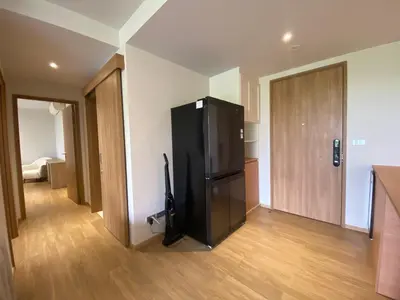 a kitchen with a black refrigerator in a room at 3bdr new apartmet in Laguna 50m form beasch LBS-3504 in Bang Tao Beach
