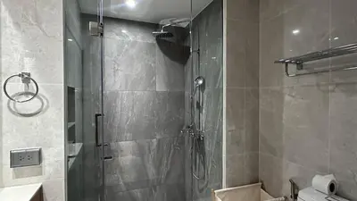 a bathroom with a shower with a glass door at 3bdr new apartmet in Laguna 50m form beasch LBS-3504 in Bang Tao Beach