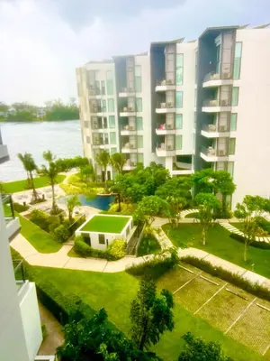 an aerial view of a resort with a tennis court at 1-bedroom apartment, Cassia Phuket in Laguna Phuket