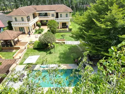 an aerial view of a house with a swimming pool at 5BR Luxury Villa Bangtao With Staff Phuket in Laguna Phuket