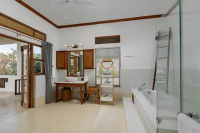 a bathroom with a desk and a sink and a tub at 50% Off Baan Angelo 3 Bed Pool Villa Kata Hill in Kata Beach