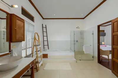 a bathroom with a tub and a sink and a shower at 50% Off Baan Angelo 3 Bed Pool Villa Kata Hill in Kata Beach
