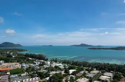 an aerial view of a city and the ocean at C239 Best Spot Beachfront 1BR Near Top Beaches in Rawai Beach