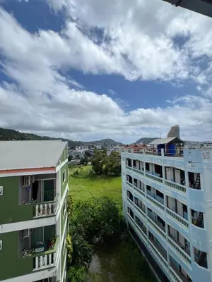 a view from the balcony of a building at SVAH Boutique Patong in Patong Beach