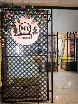 a metal gate with a sign on it in a store at MT friendhome&hostel2 in Phuket Town