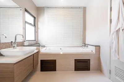 a bathroom with a tub and a sink at The Golden Palm Residence - Kathu - 10 min to Patong Beach in Kathu