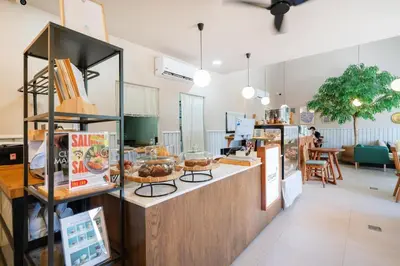 a bakery with a counter with pastries on it at Private pool villa in the heart of Bangtao in Bang Tao Beach