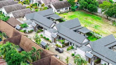 an overhead view of a house with houses at summer stay pool villa in Ban Na Bon