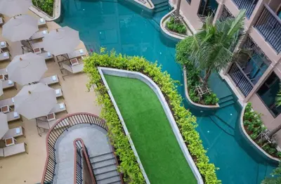 an aerial view of a resort with a swimming pool at New 1BR Apartment in The Proud Karon Phuket in Karon Beach