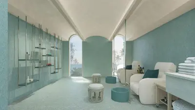 a bathroom with blue walls and white furniture and a sink at Myneris Hotel, Phuket Karon Beach in Karon Beach