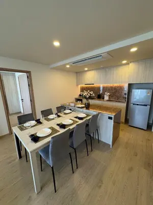 a large dining room with a table and chairs at New luxury condo Ozone next to Laguna in Phuket