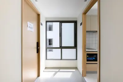 an open door in a room with a window at Fantasea Condo Kamala B502 1BDRM by Phuket Sabay Rent in Kamala Beach