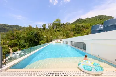 a swimming pool on a cruise ship at Fantasea Condo Kamala B502 1BDRM by Phuket Sabay Rent in Kamala Beach