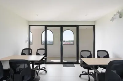 a conference room with tables and chairs and windows at Fantasea Condo Kamala B502 1BDRM by Phuket Sabay Rent in Kamala Beach