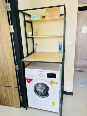 a washer and dryer in a small room at MBC Condotel Maikhao beach in Mai Khao Beach