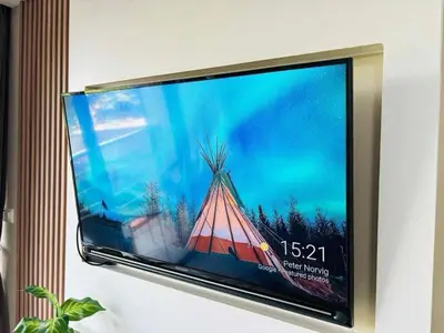 a flat screen tv with a pyramid on it at MBC Condotel Maikhao beach in Mai Khao Beach