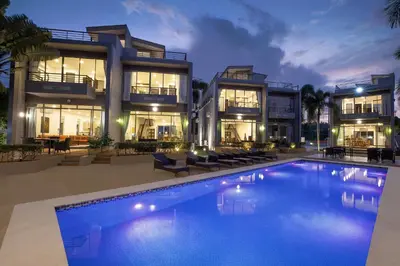 a large house with a swimming pool in front of it at 3 BR Villa with swimming pool near golf and airport - Argent 10 in Thalang