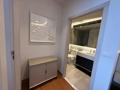 a bathroom with a sink and a mirror at Bellevue Bangtao 2 bedrooms in Laguna Phuket