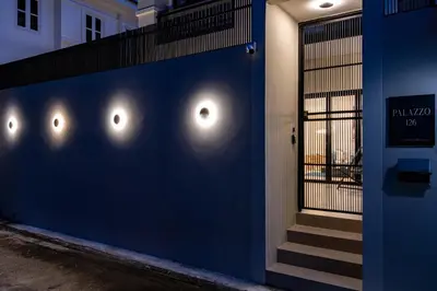 a blue wall with lights on the side of a building at Palazzo 126 Luxury 5BR Pool Villa in Patong in Patong Beach