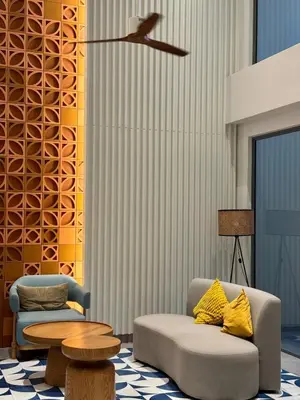 a living room with a couch and a table at New apartments in a premium Laguna complex by the lake in Bang Tao Beach